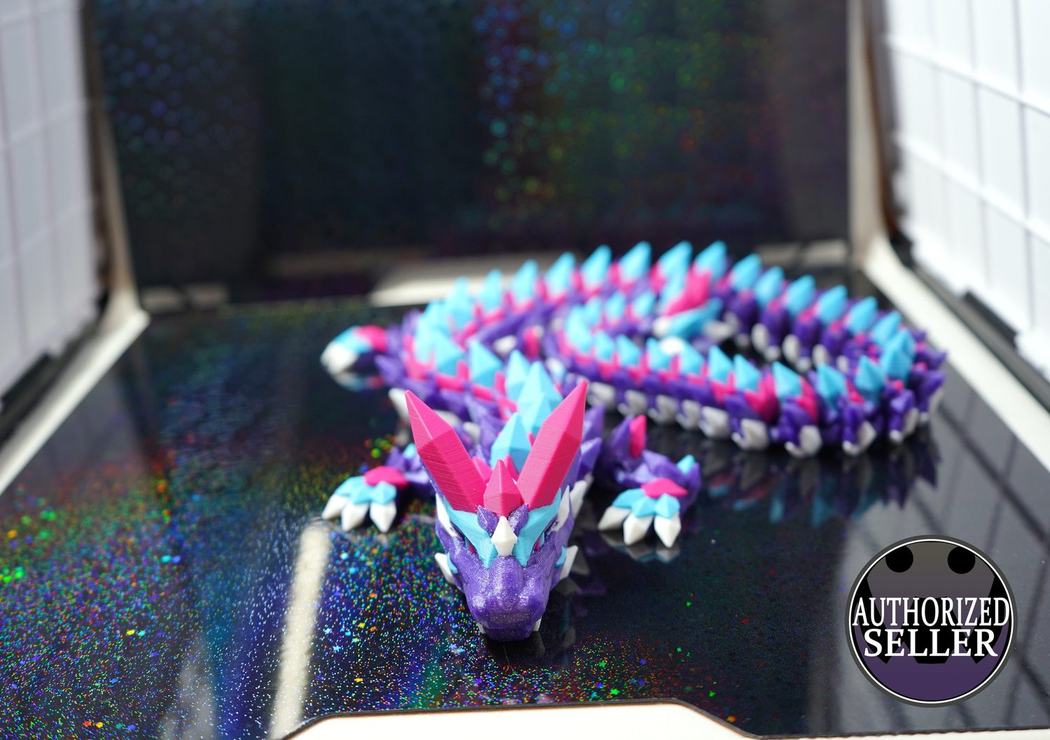 Aurora crystal dragon — articulated flexi dragon in display case