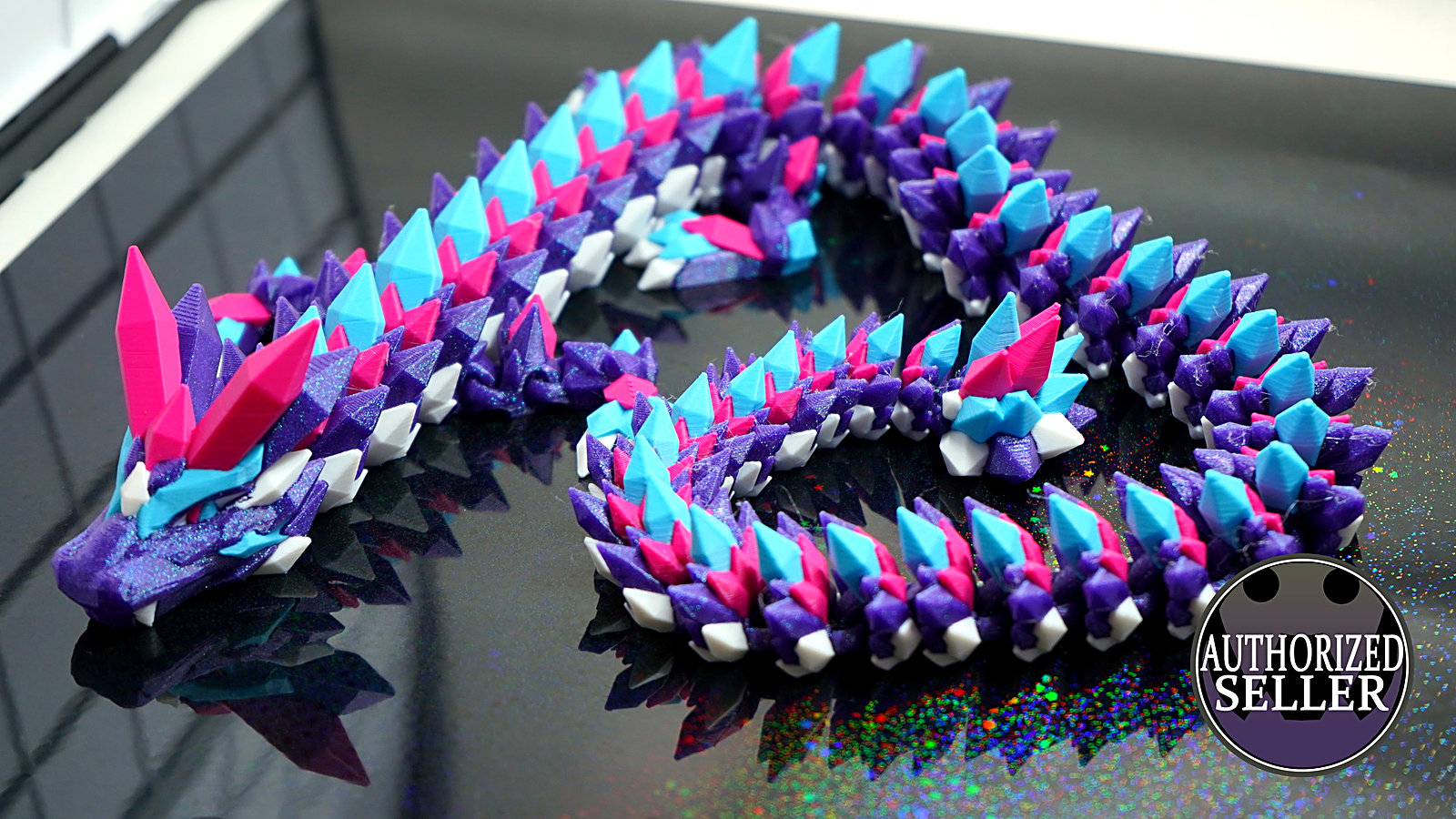 Aurora crystal dragon — purple and cyan articulated print on black, Melbourne made
